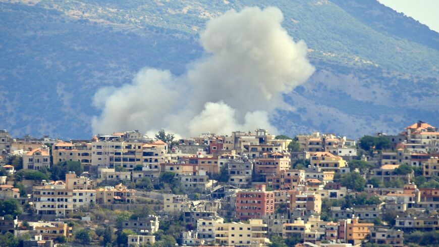 Smoke billows from the site of an Israeli airstrike in the southern Lebanese village of Khiam near the border on September 19, 2024