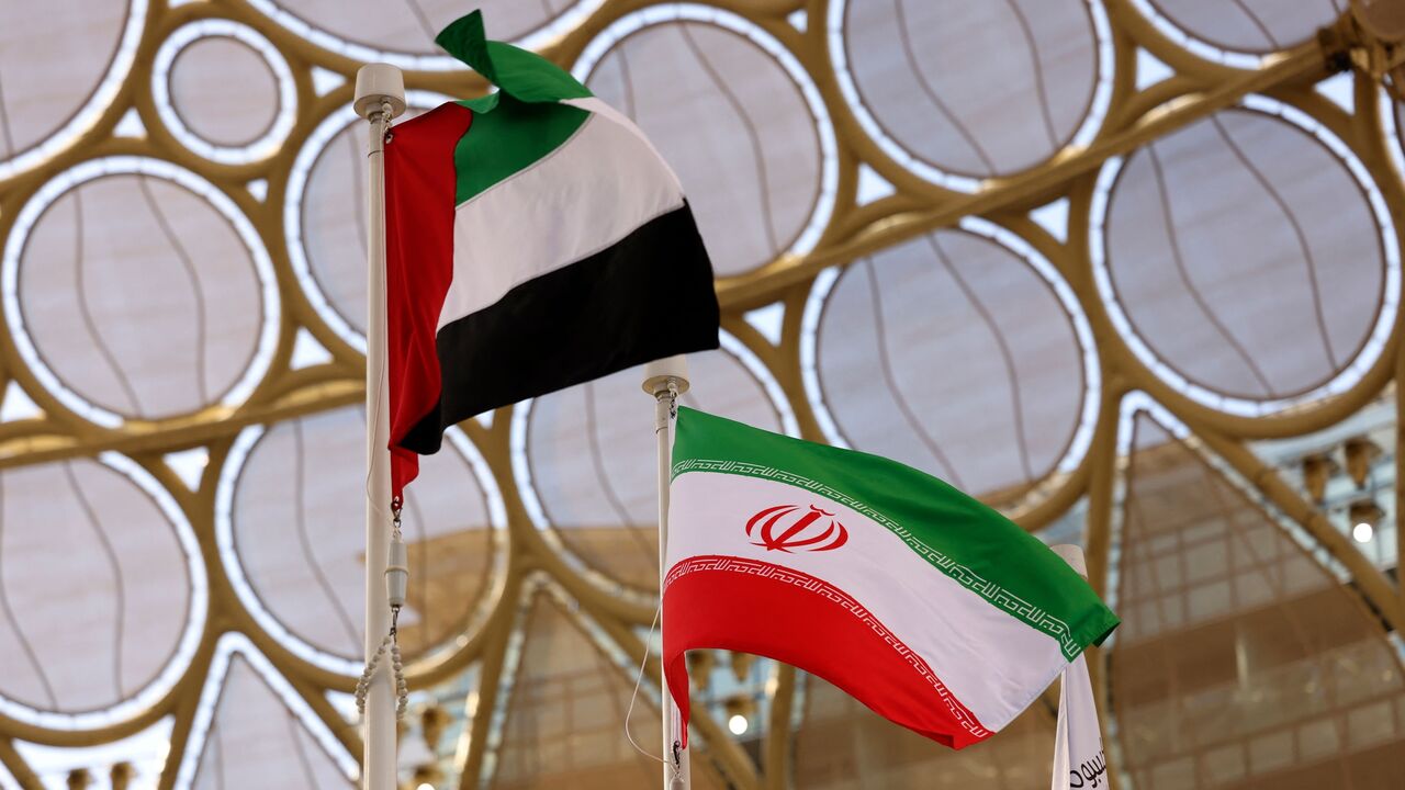 The flags of United Arab Emirates and Iran are flown during a national event at the Iranian Pavilion of Expo 2020, Dubai, Feb. 7, 2022.