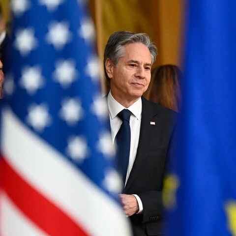 US Secretary of State Antony Blinken (R) and and European Union High Representative for Foreign Affairs and Security Policy Josep Borrell walk past the US and EU flags as they arrive for an EU-US Energy Council Ministerial Meeting in Brussels on April 4, 2023. (Photo by John THYS / AFP) (Photo by JOHN THYS/AFP via Getty Images)