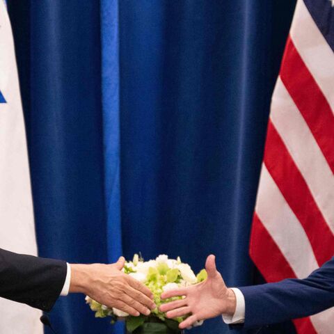 US President Joe Biden shakes hands with Israeli Prime Minister Benjamin Netanyahu as they meet on the sidelines of the 78th United Nations General Assembly in New York City on Sept. 20, 2023. 