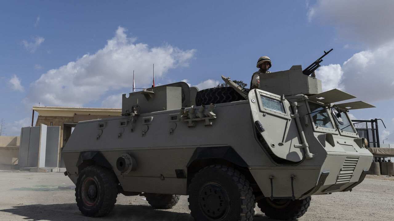 A military vehicle is seen at the Rafah border crossing to Gaza on October 19, 2023 in North Sinai, Egypt. The aid convoy, organized by a group of Egyptian NGOs, set off Saturday 14th October from Cairo for the Gaza-Egypt border crossing at Rafah. On October 7th, the Palestinian militant group Hamas launched a surprise attack on border communities in southern Israel, spurring the most violent flare-up of the Israel-Palestine conflict in decades. Israel launched a vast bombing campaign in retaliation and has