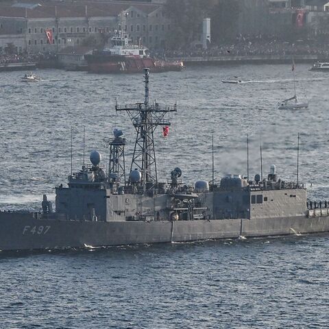 This picture taken on October 29, 2023, in Istanbul shows Turkish naval forces warship Frigates TCG F 497, Goksu sails during a military naval parade on Bosphorus to mark 100th anniversary celebrations of Turkish republic. 