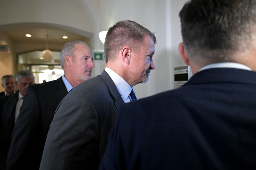 Blackwater founder Erik Prince (2ndR) arrives prior to the start of his trial for an alleged violation of the War Material Act at the Regional Court in Wiener Neustadt, Austria on November 16, 2023. Prince, founder and former CEO and chairman of private military company Blackwater, is on trial with four other defendants. (Photo by Joe Klamar / AFP) (Photo by JOE KLAMAR/AFP via Getty Images)