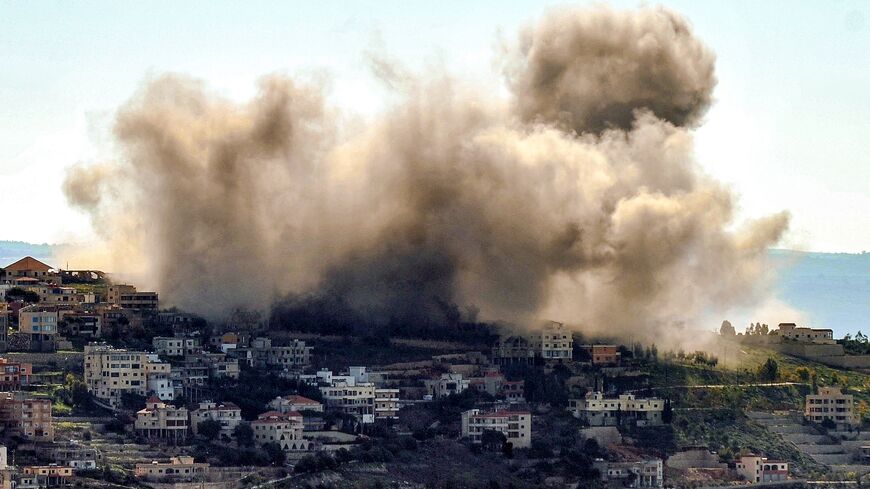 Smoke billows above the village of Khiyam, in southern Lebanon, during an Israeli bombardment near the Lebanese border, Feb. 8, 2024.