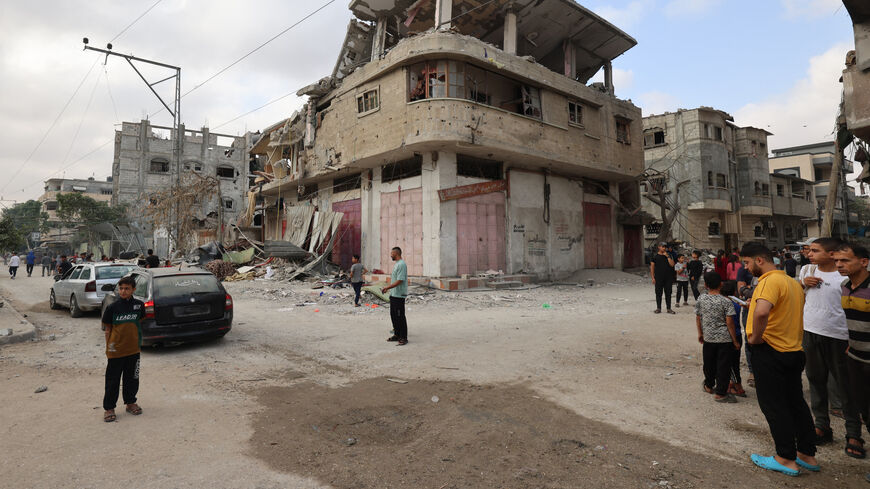 Palestinians inspect the damage to buildings after Israeli bombardment in Rafah in the southern Gaza Strip, on April 29, 2024 amid the ongoing conflict between Israel and the Palestinian militant group Hamas.