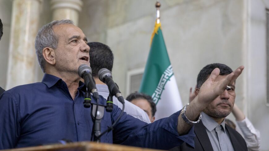 Newly elected Iranian President Masoud Pezeshkian speaks during a visit to the shrine of the Islamic Republic's founder, Ayatollah Ruhollah Khomeini, on July 6, 2024, in Tehran, Iran. 