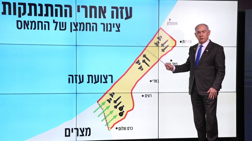 Israeli Prime Minister Benjamin Netanyahu stands before a map of the Gaza Strip during a news conference in Jerusalem on September 2, 2024.