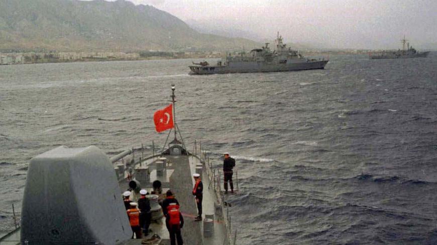 Ships from the Turkish Navy head towards the port of Kyrenia in northern Cyprus November 18. The Turkish navy anchored off Kyrenia to participate in a joint military exercise involving Turkish Cypriots and Turkish forces in the northern part of island.

FS/JDP - RP1DRIGYCJAB