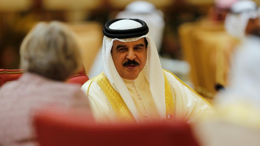 Bahrain's King Hamad bin Isa Al Khalifa (R) speaks to British Prime Minister Theresa May (L) during the first Gulf Cooporative Council's (GCC) " GCC British Summit", in Sakhir Palace Bahrain, December 7, 2016. REUTERS/Hamad I Mohammed - RC1FD09BAAF0