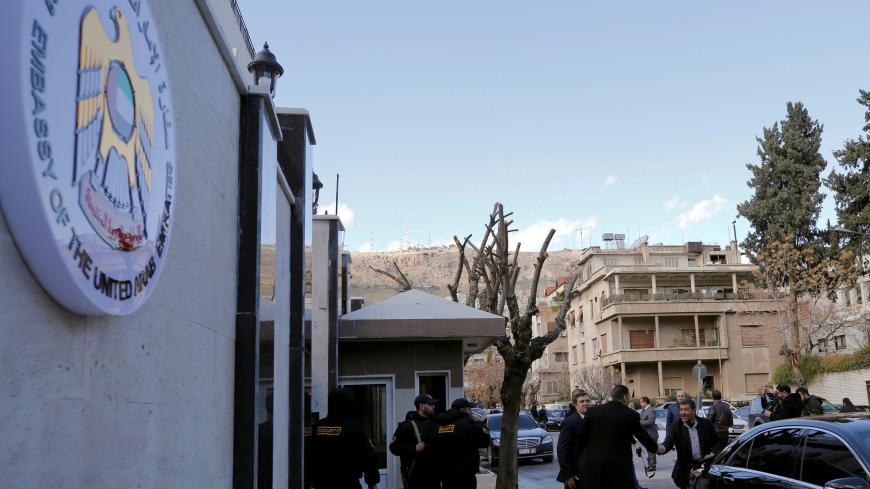 Security guards stand in front of the United Arab Emirates embassy during its reopening in Damascus, Syria December 27, 2018. REUTERS/Omar Sanadiki - RC1F43BEB420